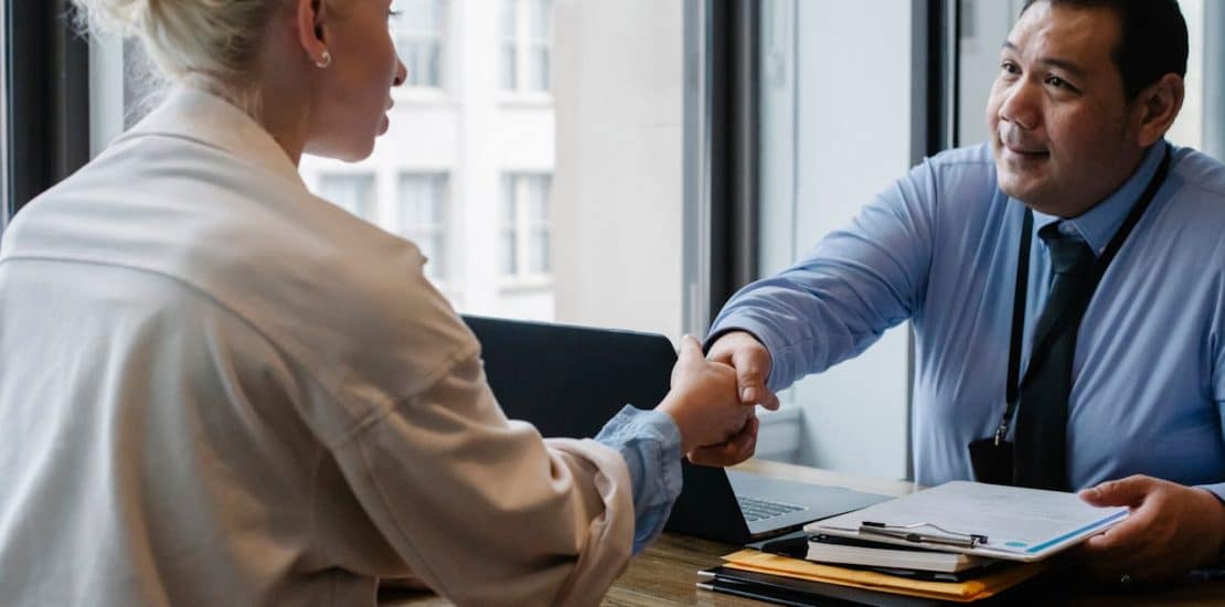 employer and employee discussing severance payment