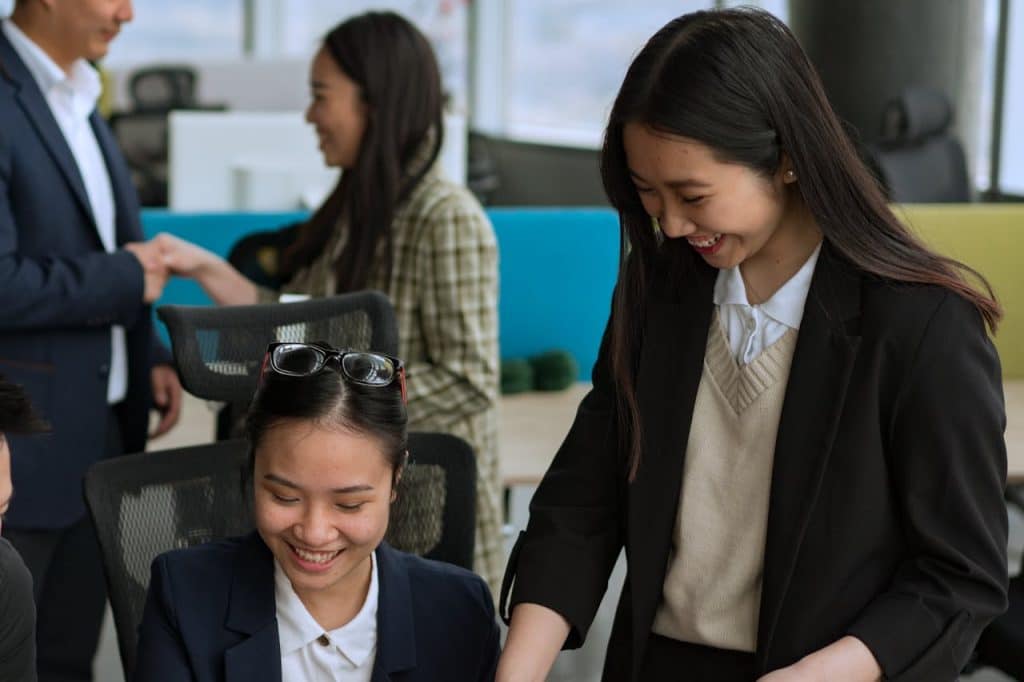 A HR team discussing Human Resource Management System