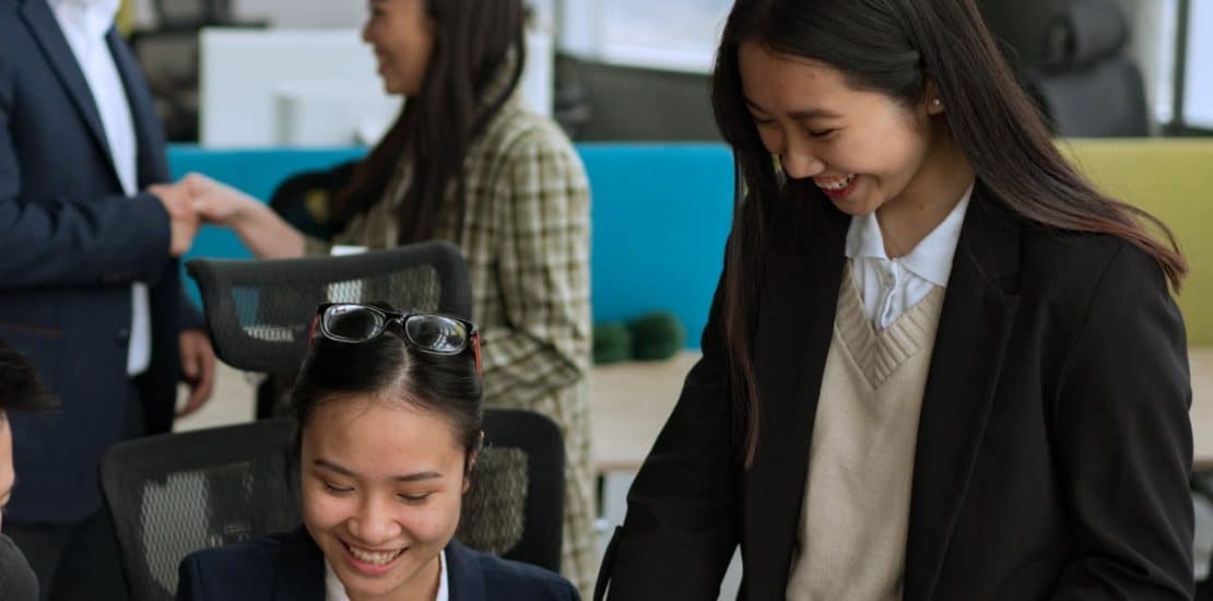 A HR team discussing Human Resource Management System